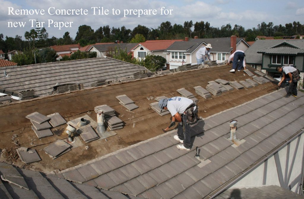 Removing concrete tile roof for new tar paper replacement California